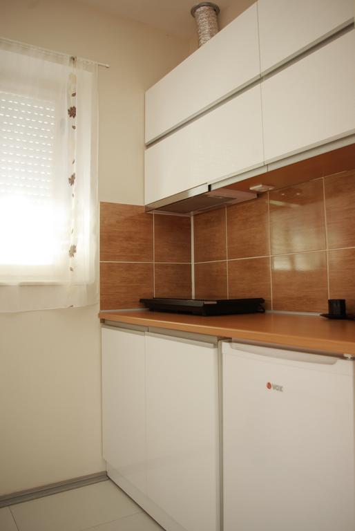 Square Studio Apartment Ni Extérieur photo